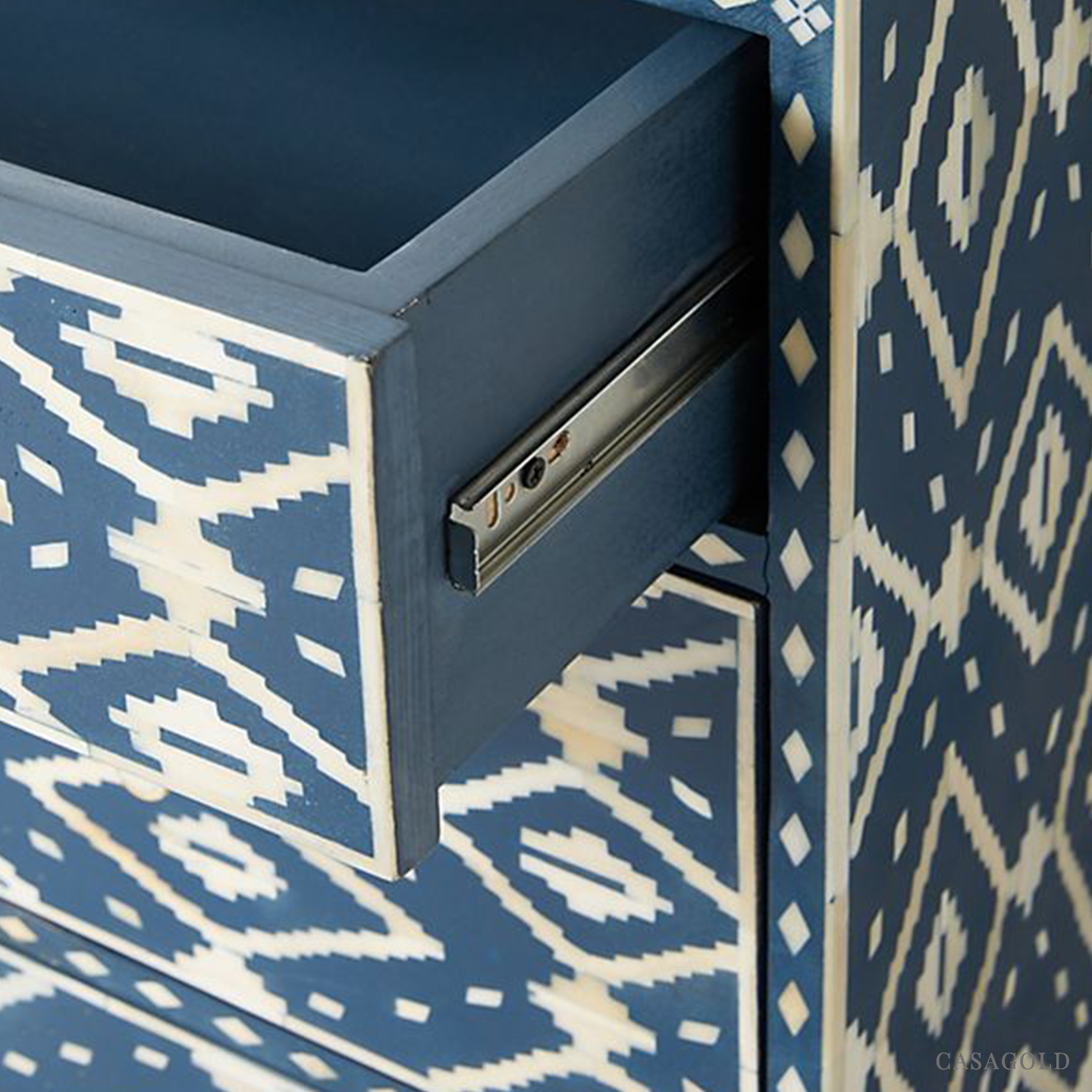 Antique brass and bone inlay bar cabinet with luxurious detailing.