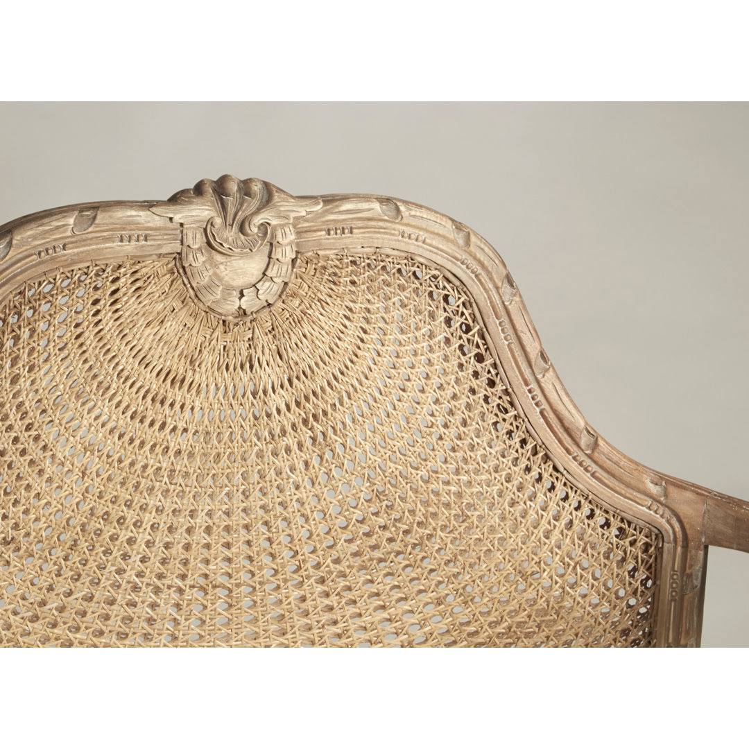 Coastal chic rattan two-seater luxury sofa with natural finish