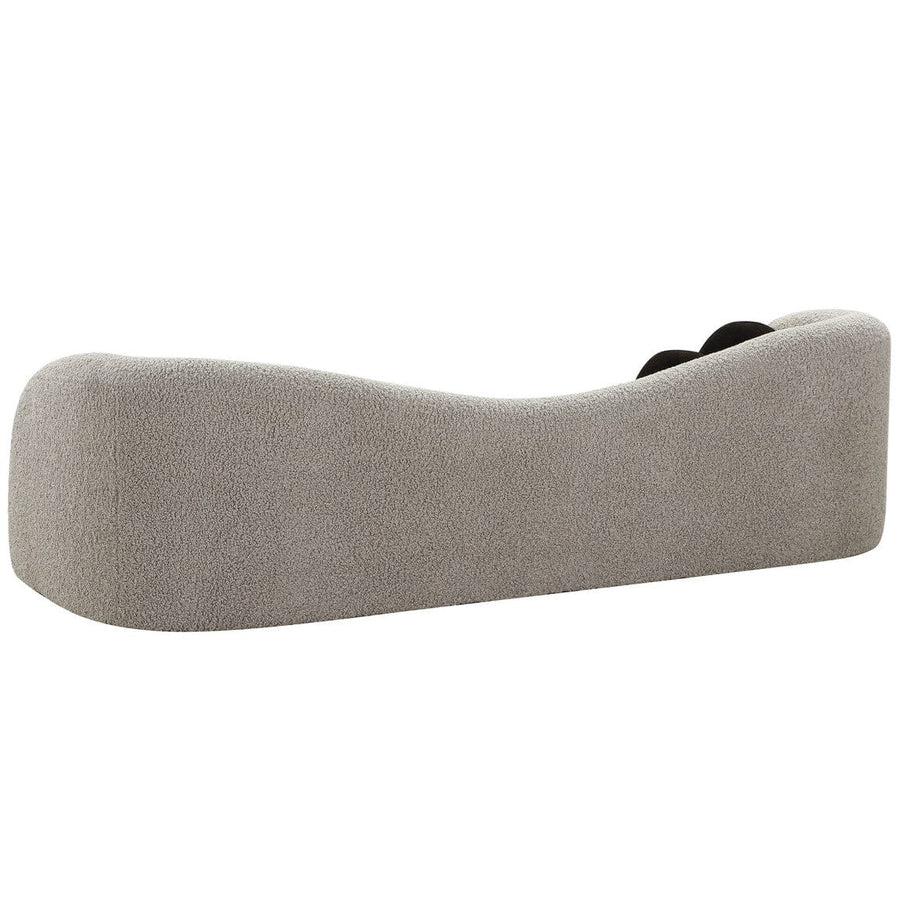 "Designer velvet luxury sofa with plush pillows for comfort"