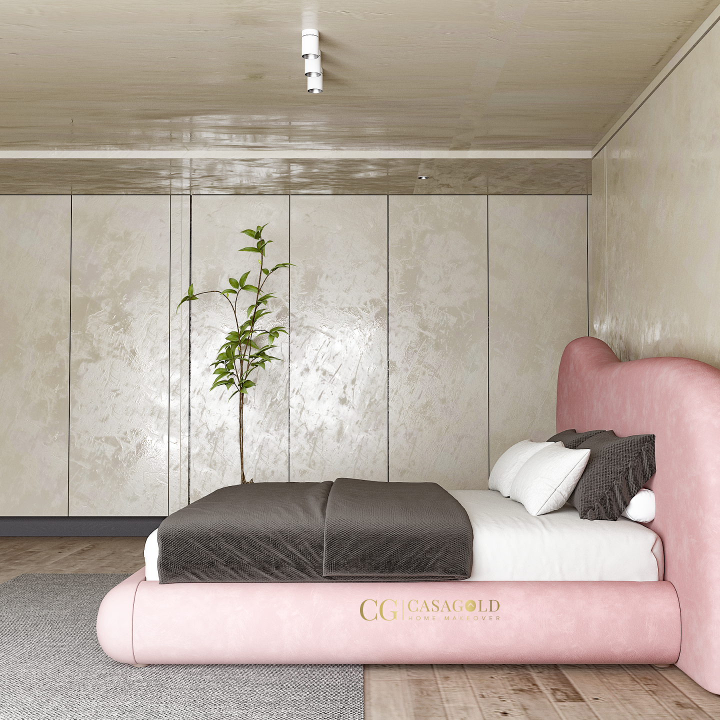 Stylish bedroom featuring a custom pink velvet bed with an asymmetrical headboard