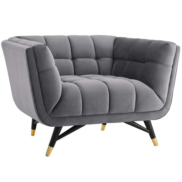 Elegant shell-back chair with brass legs for luxury homes