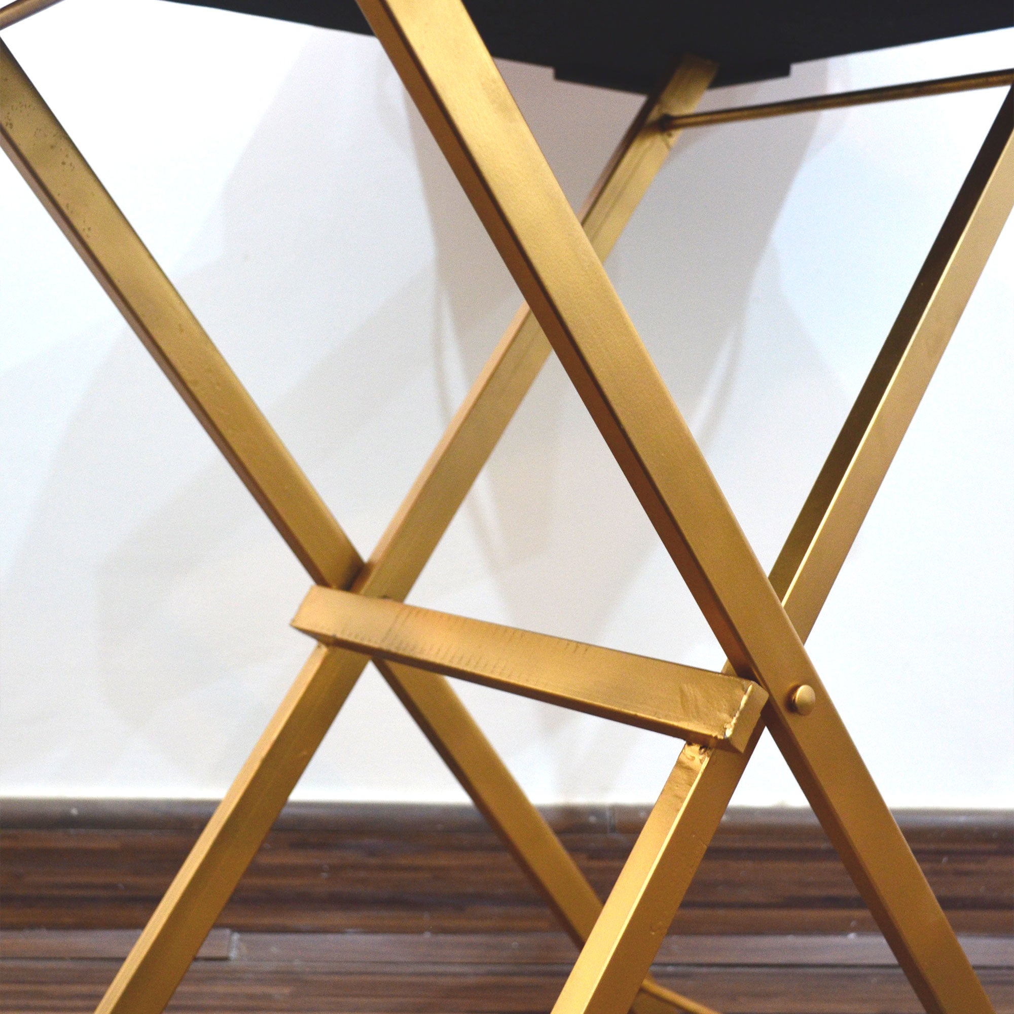 Versatile folding butler tray for indoor or outdoor use.
