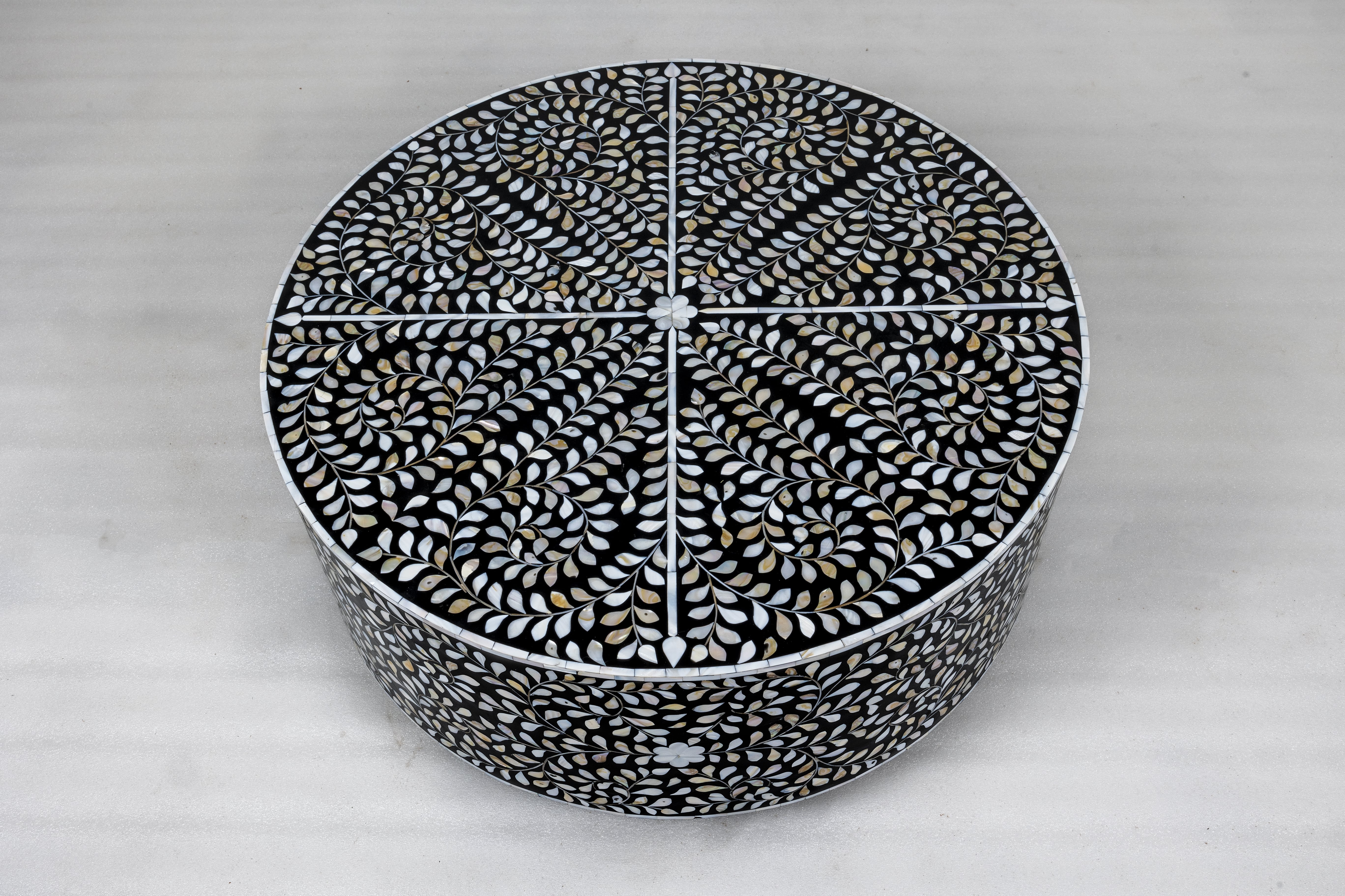 Intricate round bone inlay coffee table