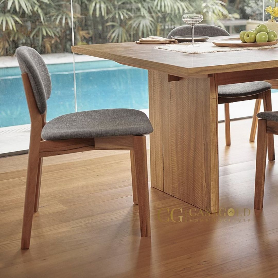 Arched-back dining chair with luxurious upholstery