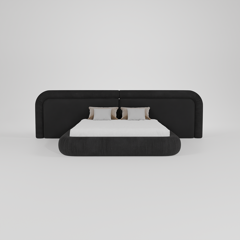 A modern platform bed with a tall, rounded headboard upholstered in black fabric, styled with a white mattress and two neutral pillows, set against a seamless light gray studio background.