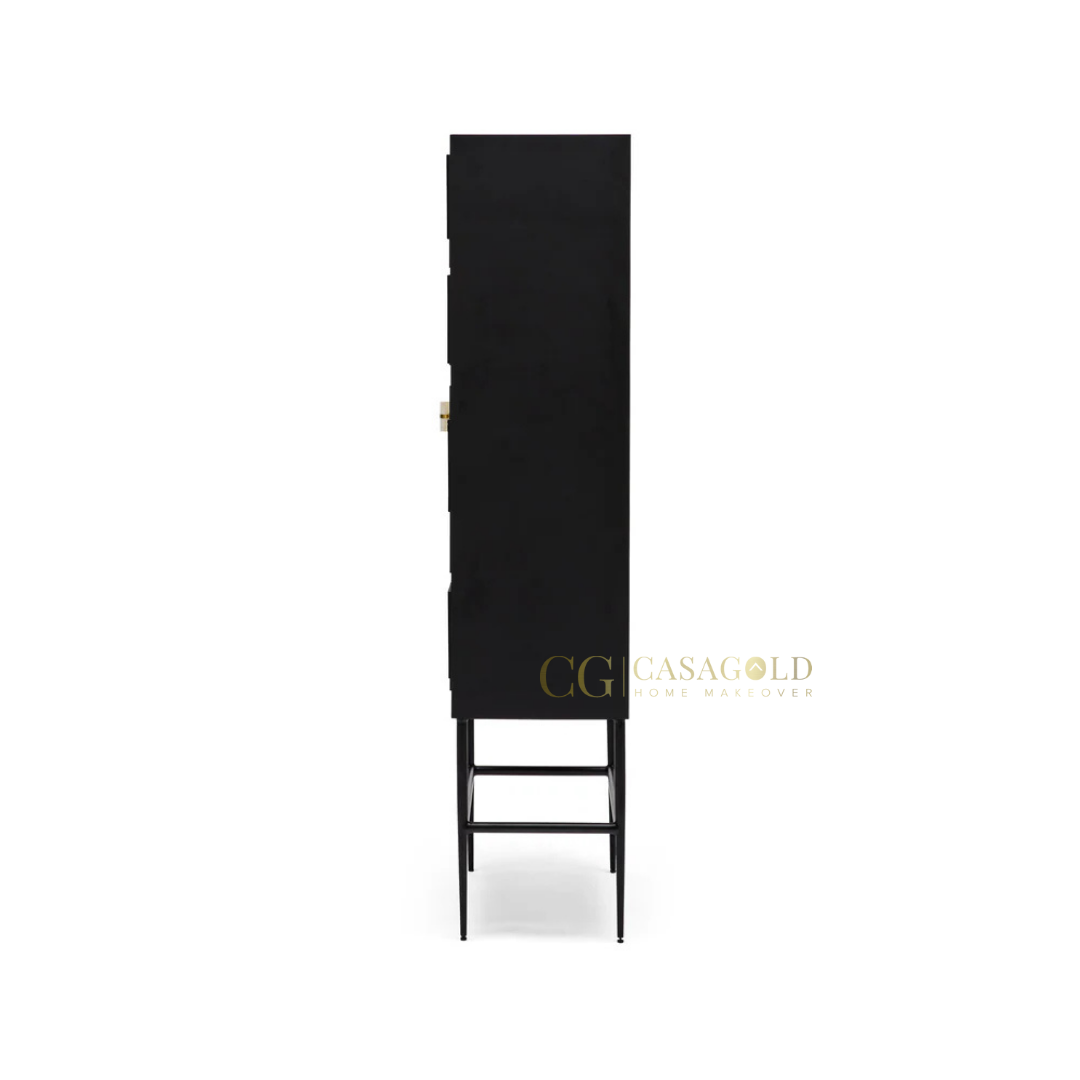 Unique cabinet showcasing bold modern art design next to a rounded, plush armchair.
