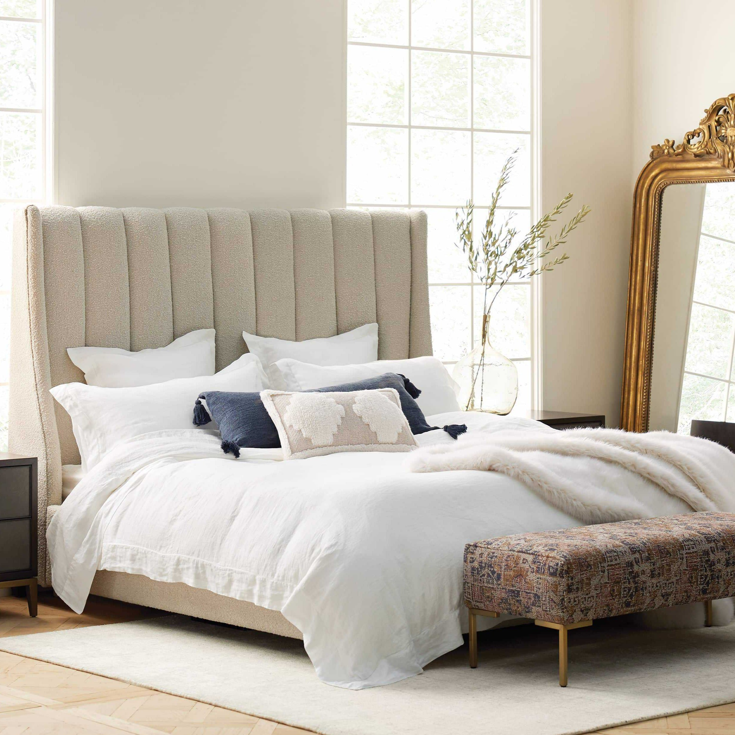 Minimalist wings bed with plush, soft headboard