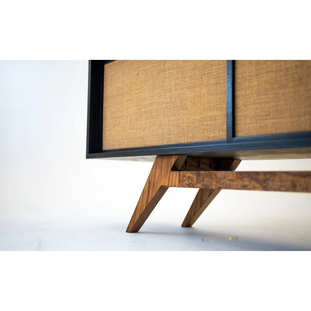 Mid-century modern sideboard with cane detailing and black frame
