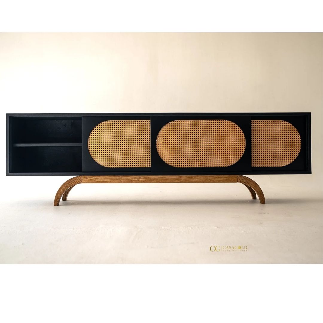 Sleek black media console featuring woven rattan cabinet doors.