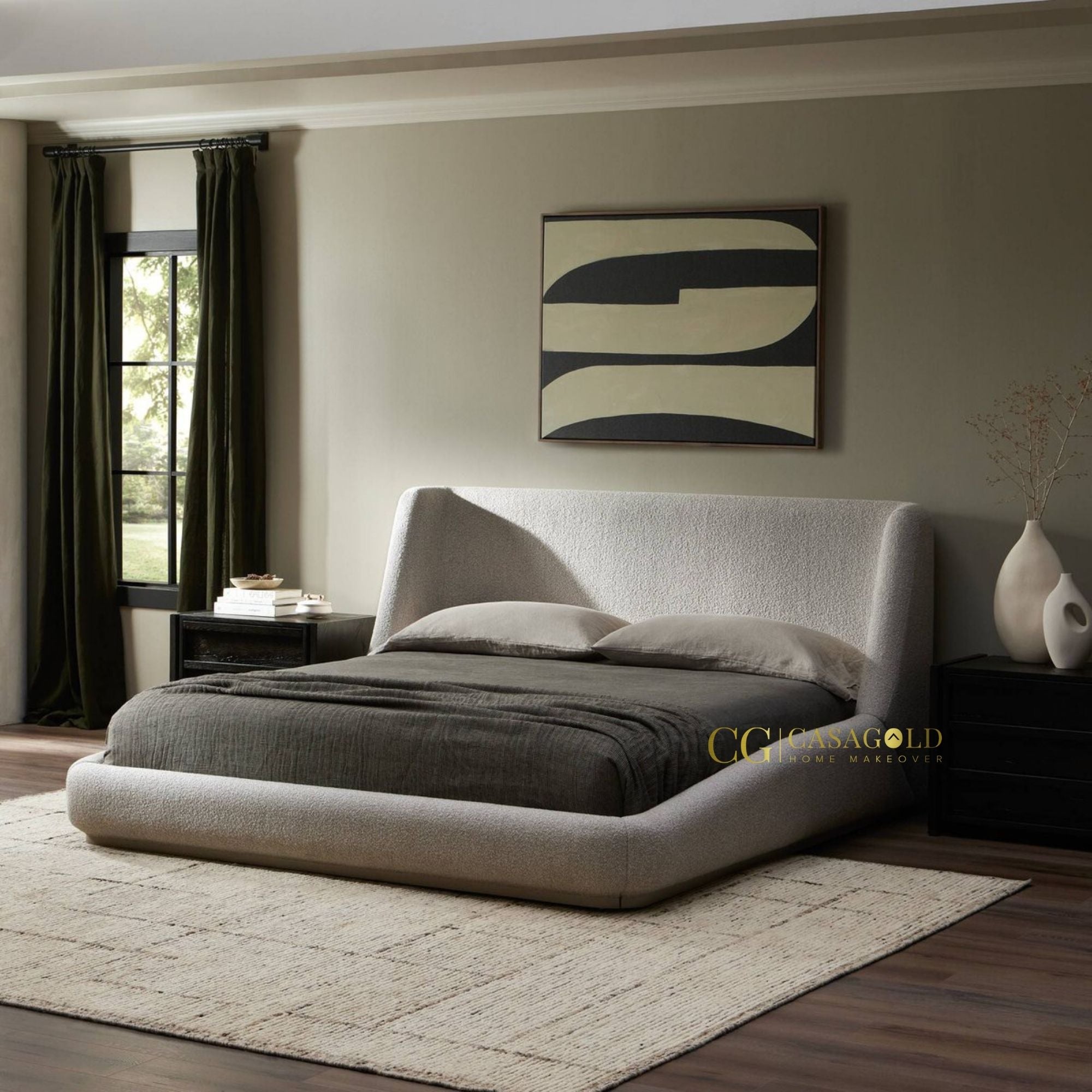 Upholstered bed with a curved headboard.