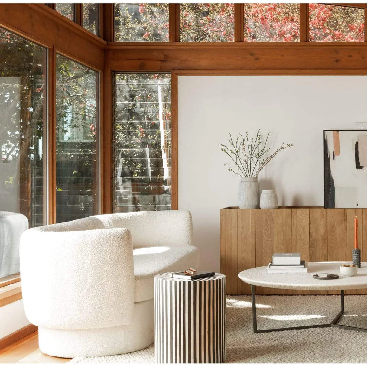 "Monochrome luxury sofa with minimalist design and plush seating"