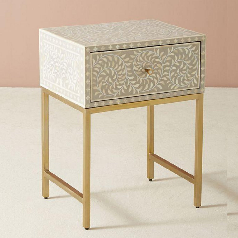 "Multicolor bone inlay bedside table with decorative rectangular gold legs for vibrant decor"