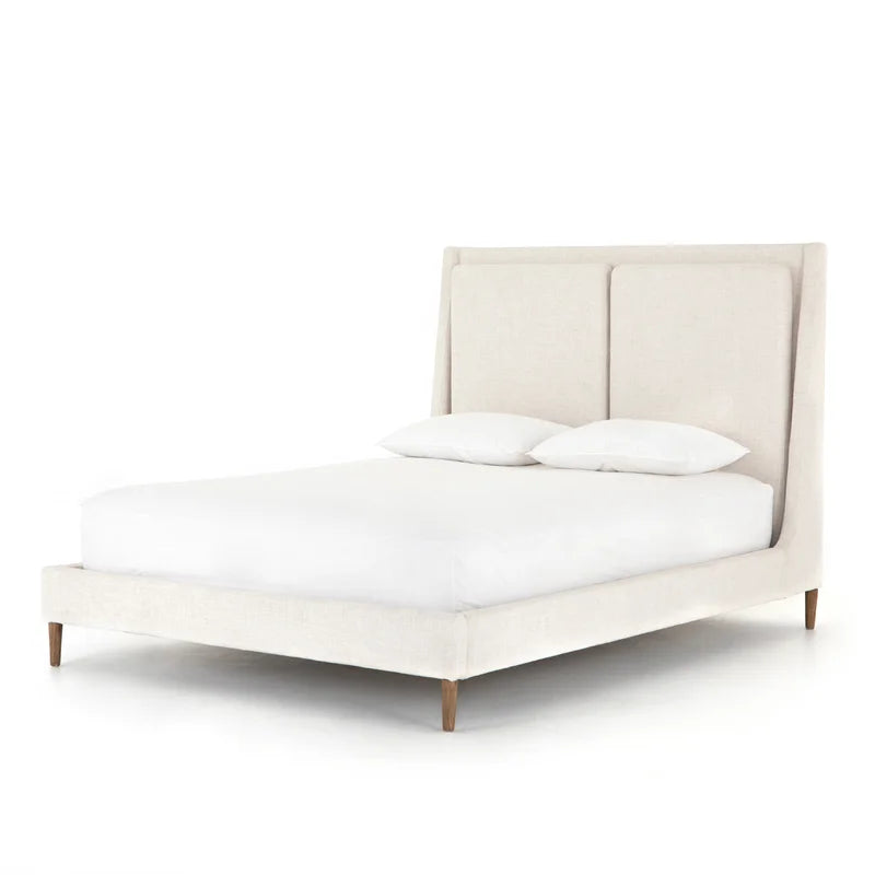 Tufted headboard wings bed for a luxe appeal