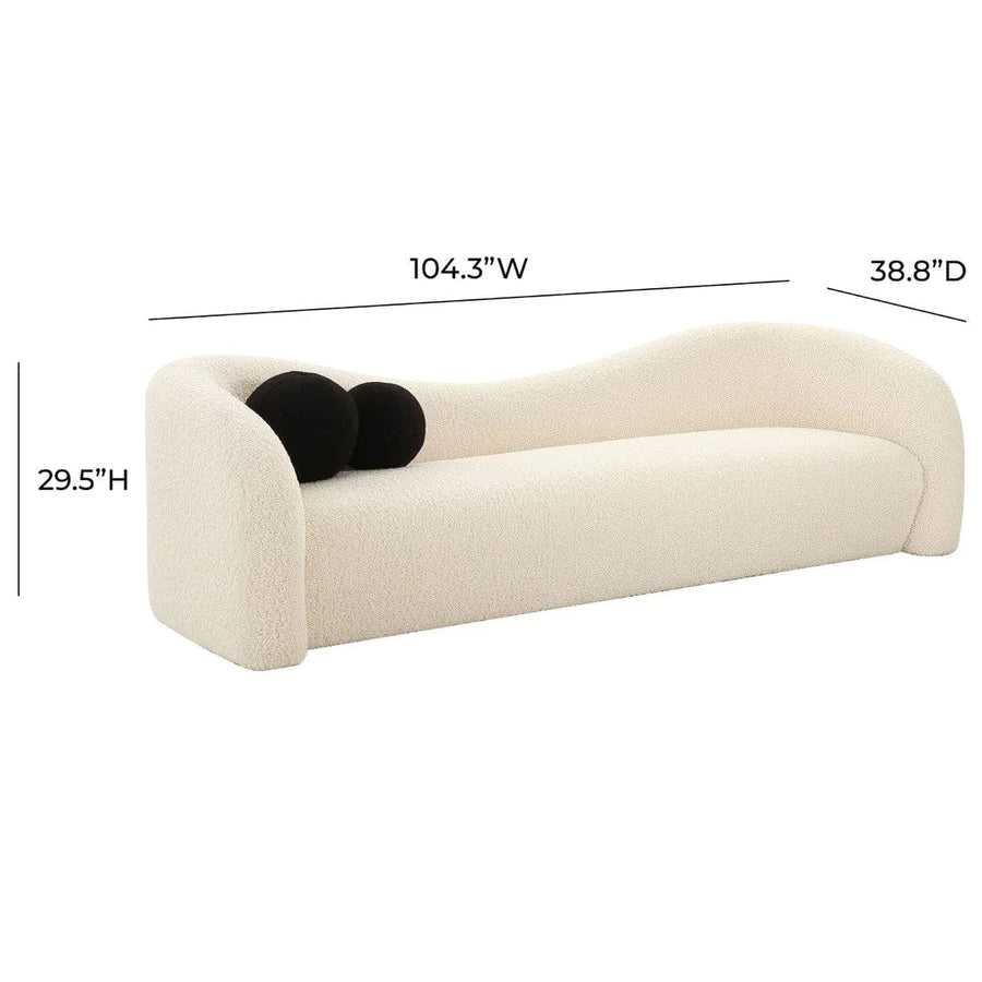 "Sleek track-arm sofa with modern luxury and simplicity"
