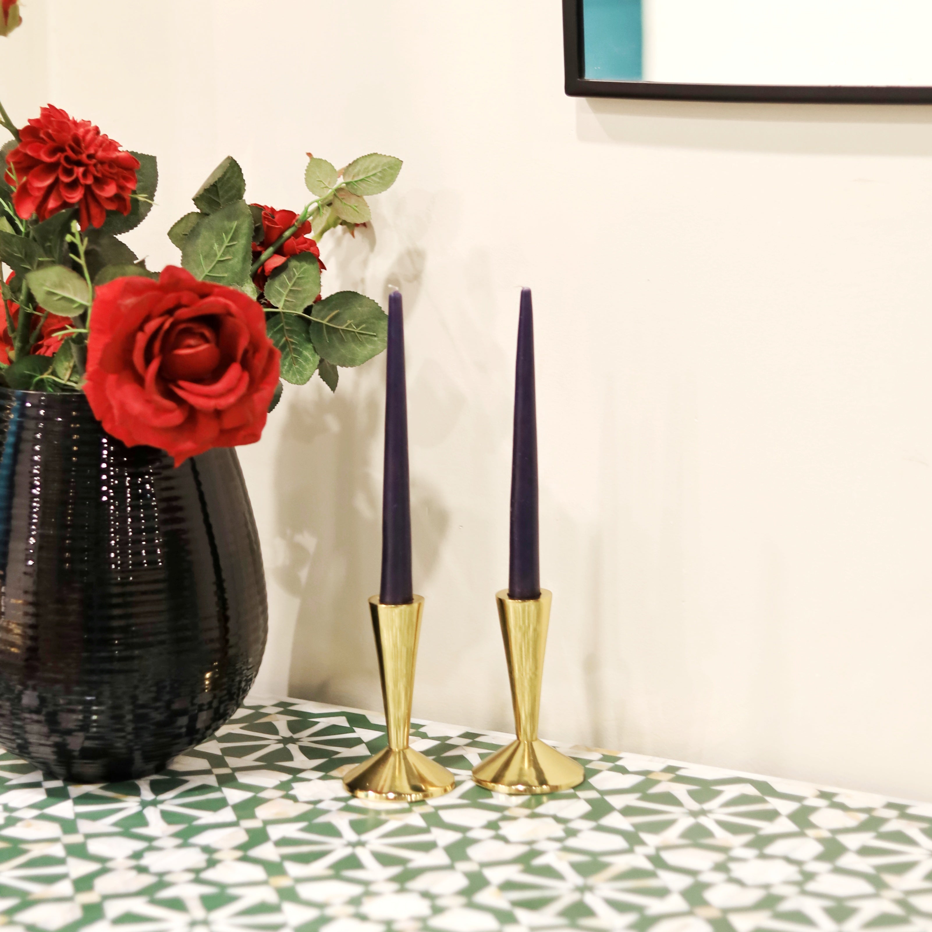 Small brass candle holder with tea light