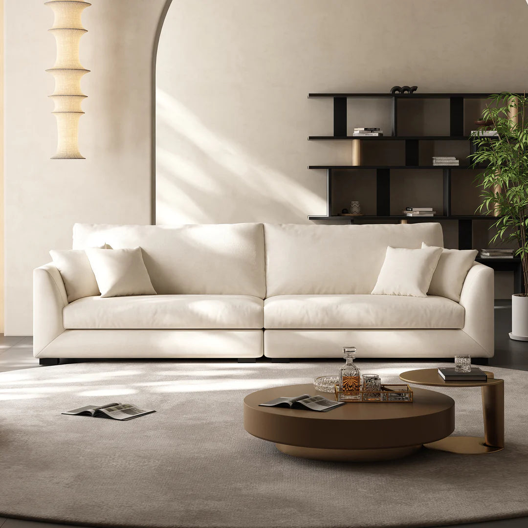 Stylish charcoal upholstered sofa with plush backrests and sturdy frame, 3-seater, convertible to 2-seater.