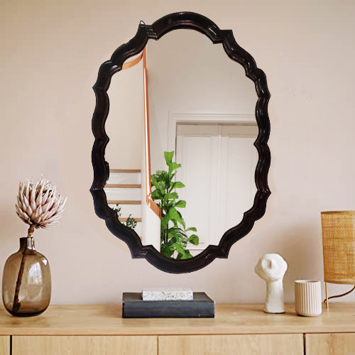 Antique oval glass mirror with vintage design