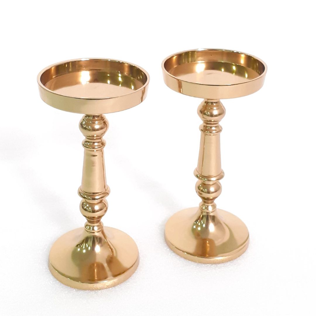 Antique brass candle holder with candles