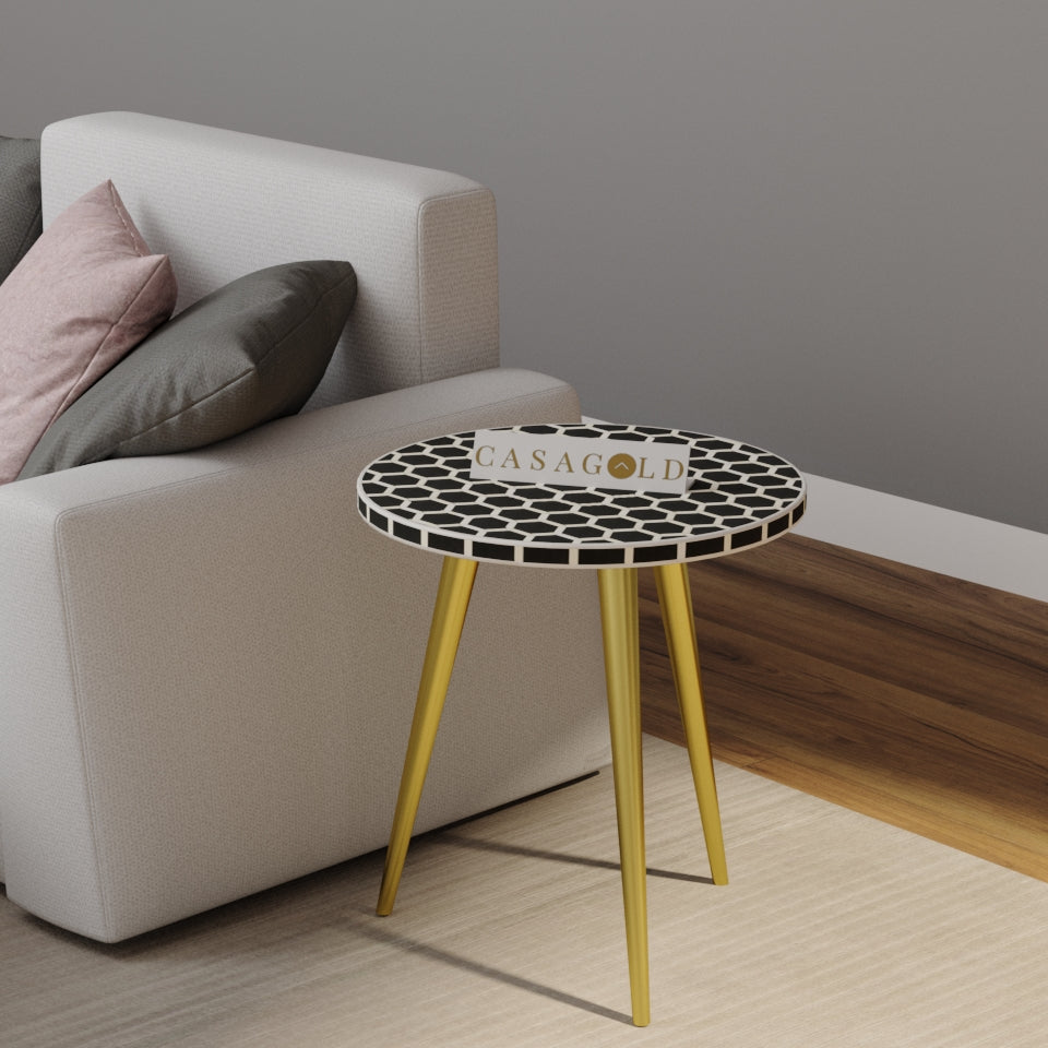 "Black round inlay side table featuring a geometric design and 3-leg support"