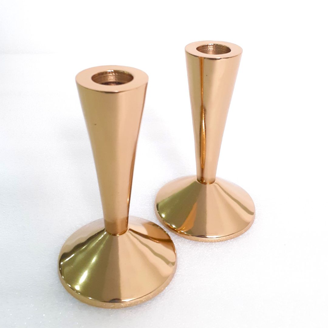 Brass candelabra with glowing candles