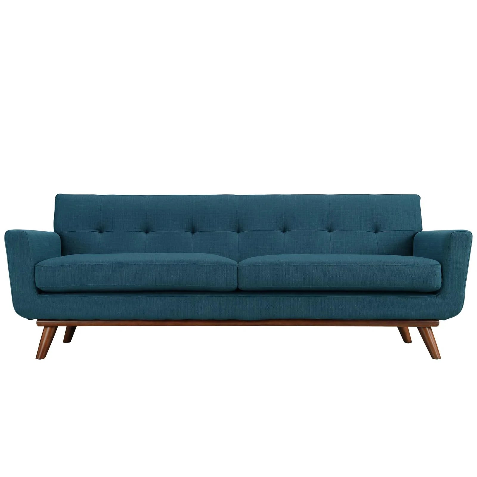 Coastal chic Teal luxury sofa with airy beach vibe