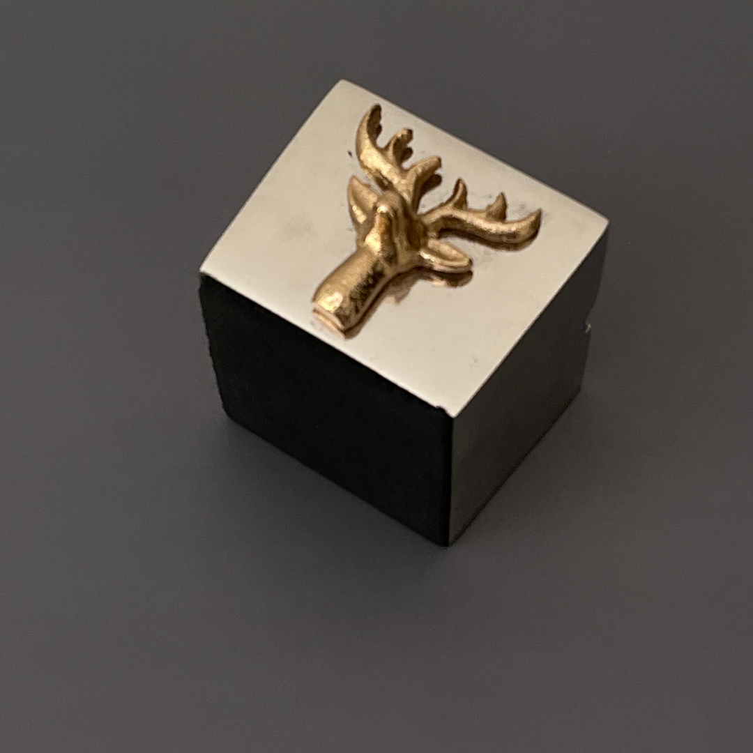 Exquisite ashtray with designer stag embellishments. designer metal ashtray