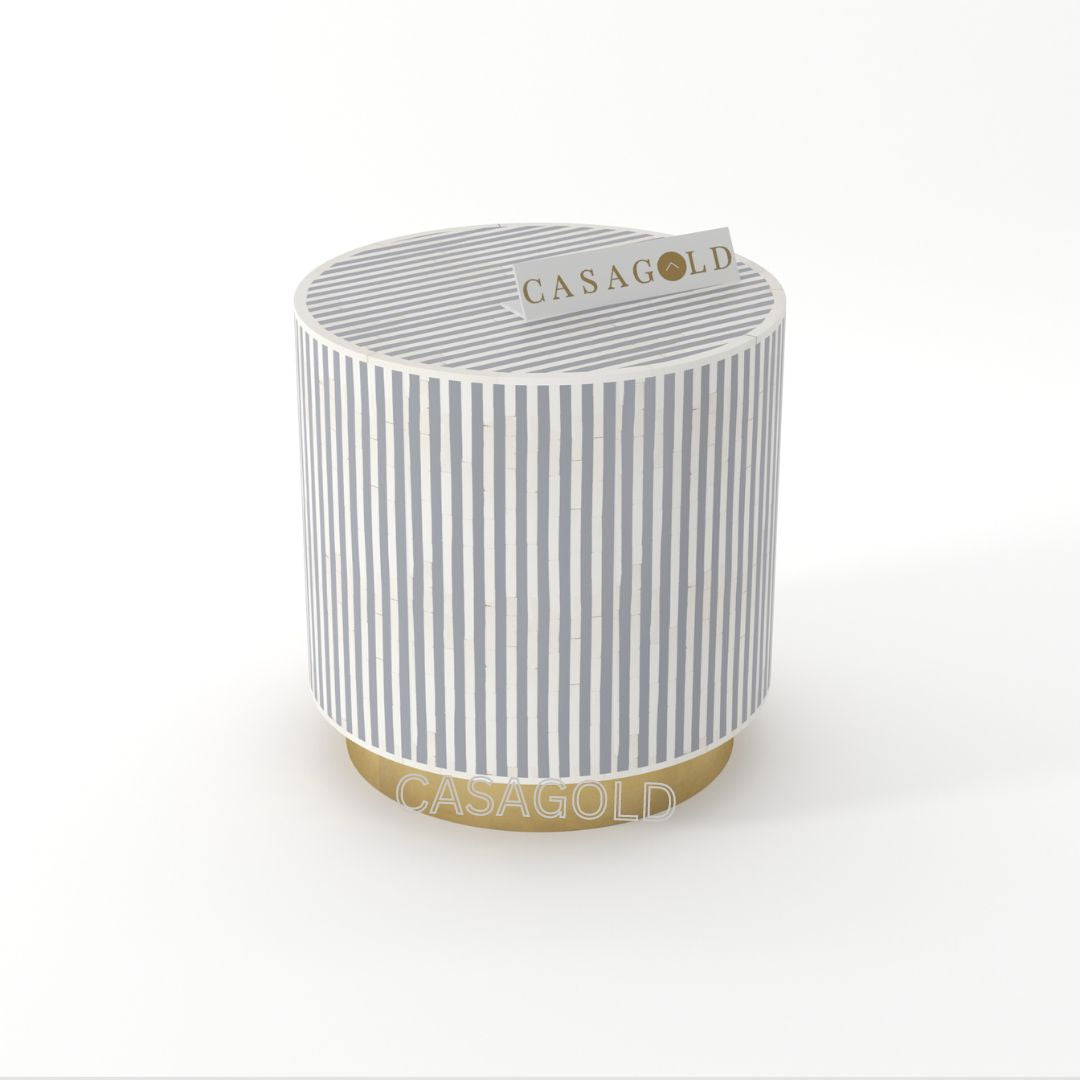 "Grey drum-shaped inlay side table featuring artistic patterns"