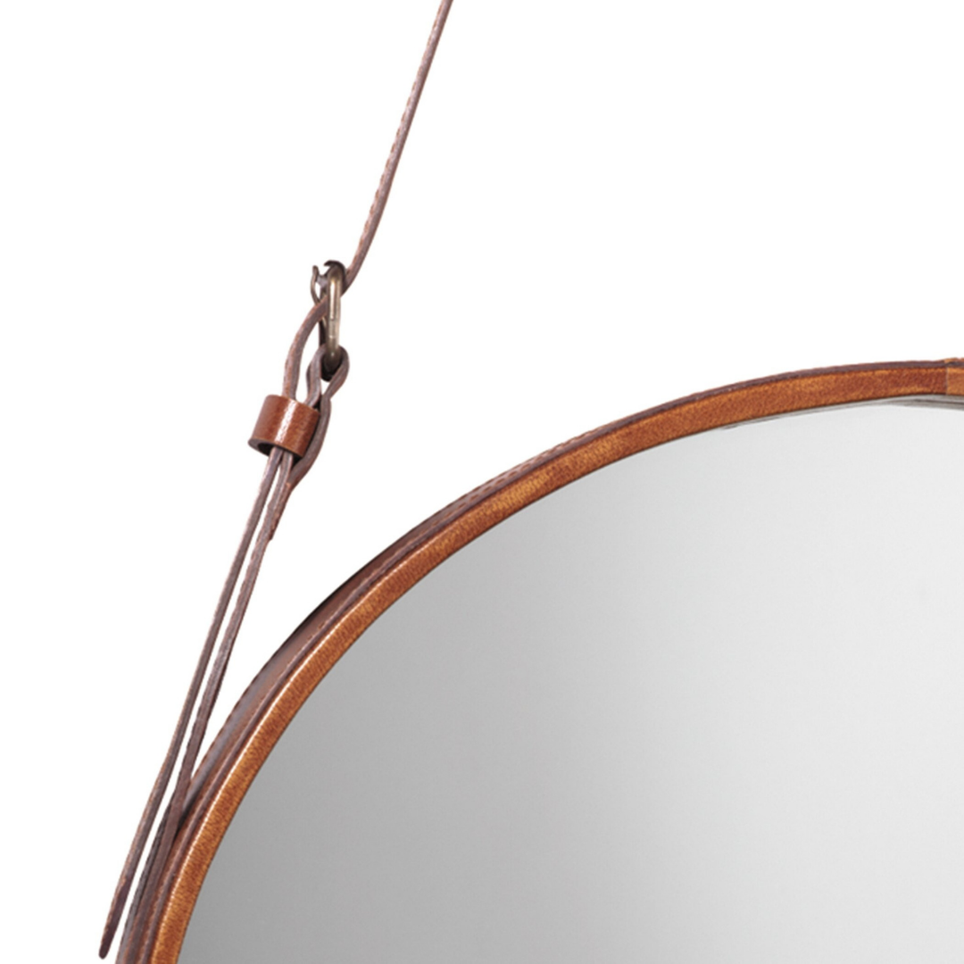 "Leather strap hanging mirror with a minimalist frame for versatile wall decor."