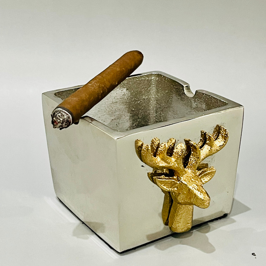 High-end ashtray with elegant stag antler accents. cigarette disposal receptacle