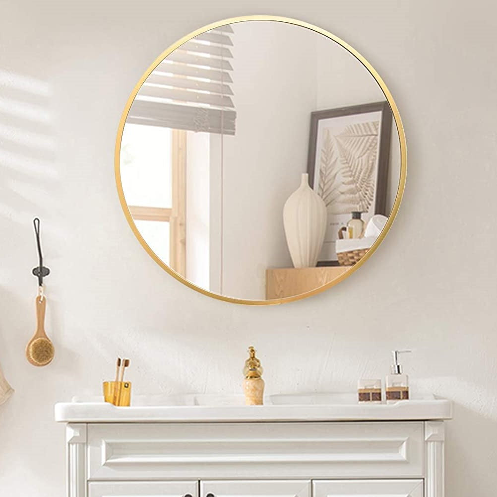 Minimalist gold finish round steel frame glass mirror for chic interiors