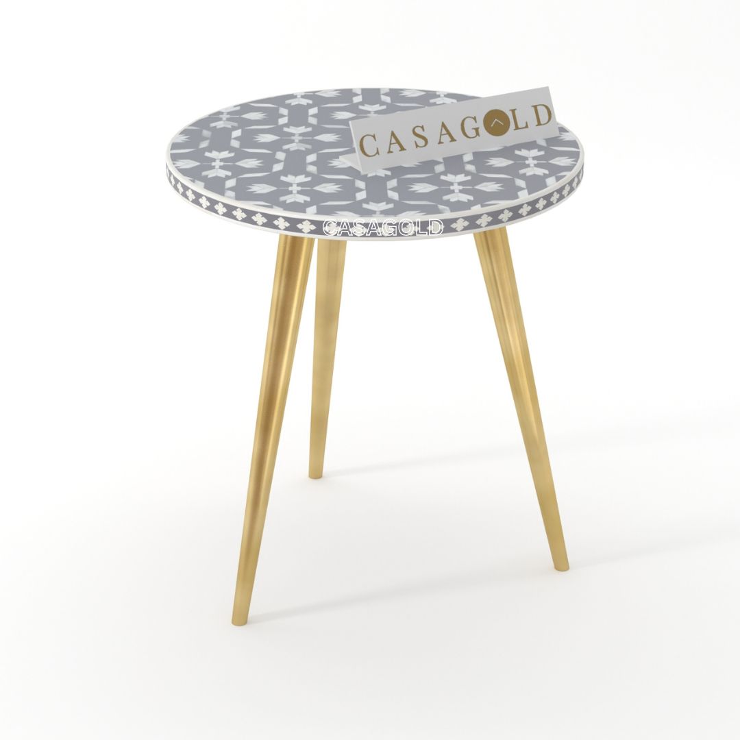 "Round inlay side table with Floral -inspired patterns and three legs"