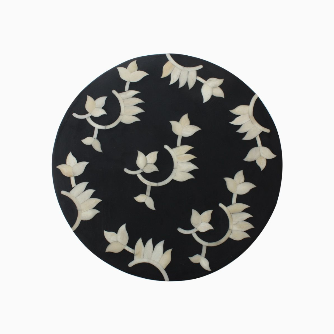 "Sleek drum-shaped inlay side table with contemporary patterns"