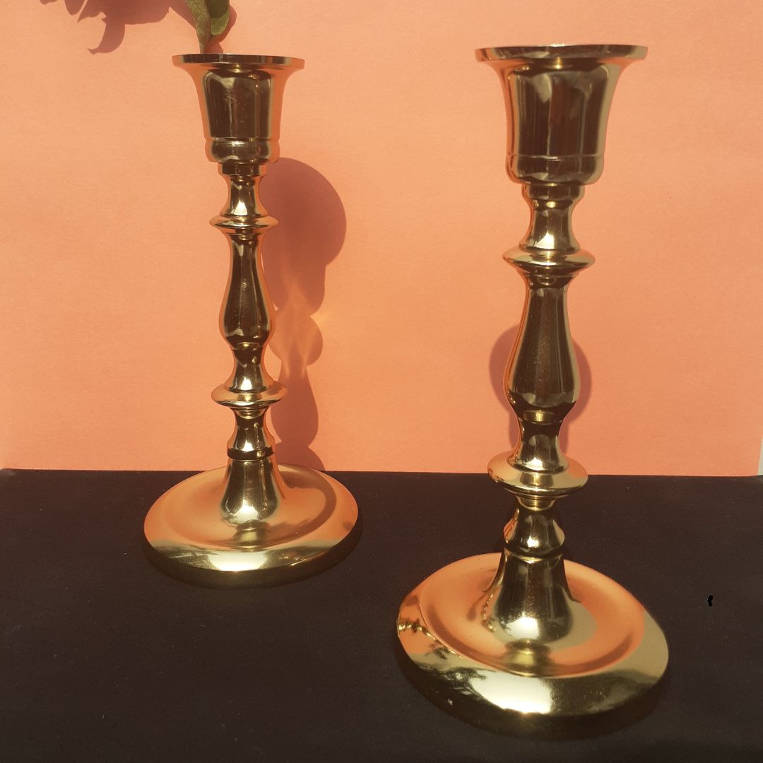 Tall brass holder for dramatic candlelight