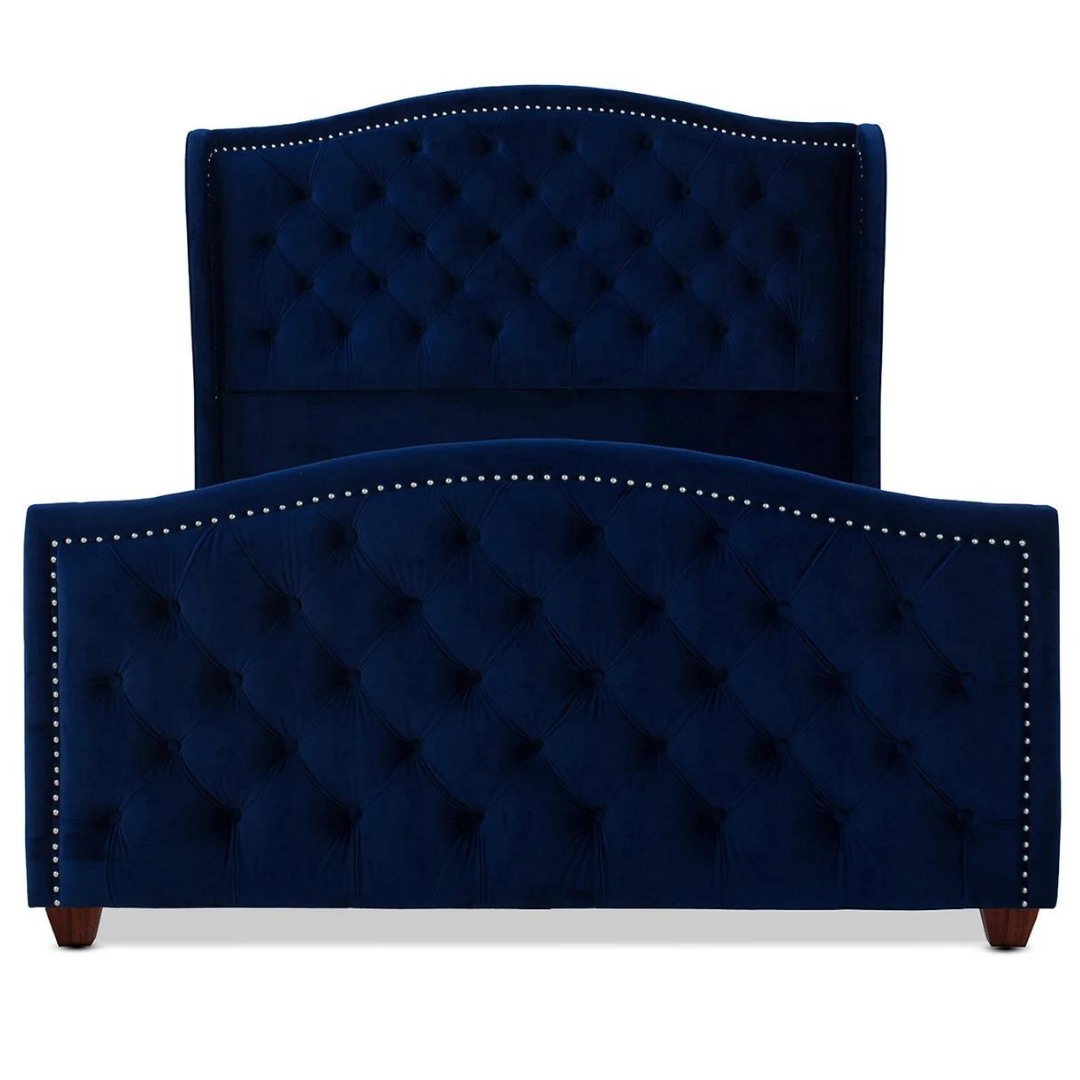 King wings bed with tufted headboard detail