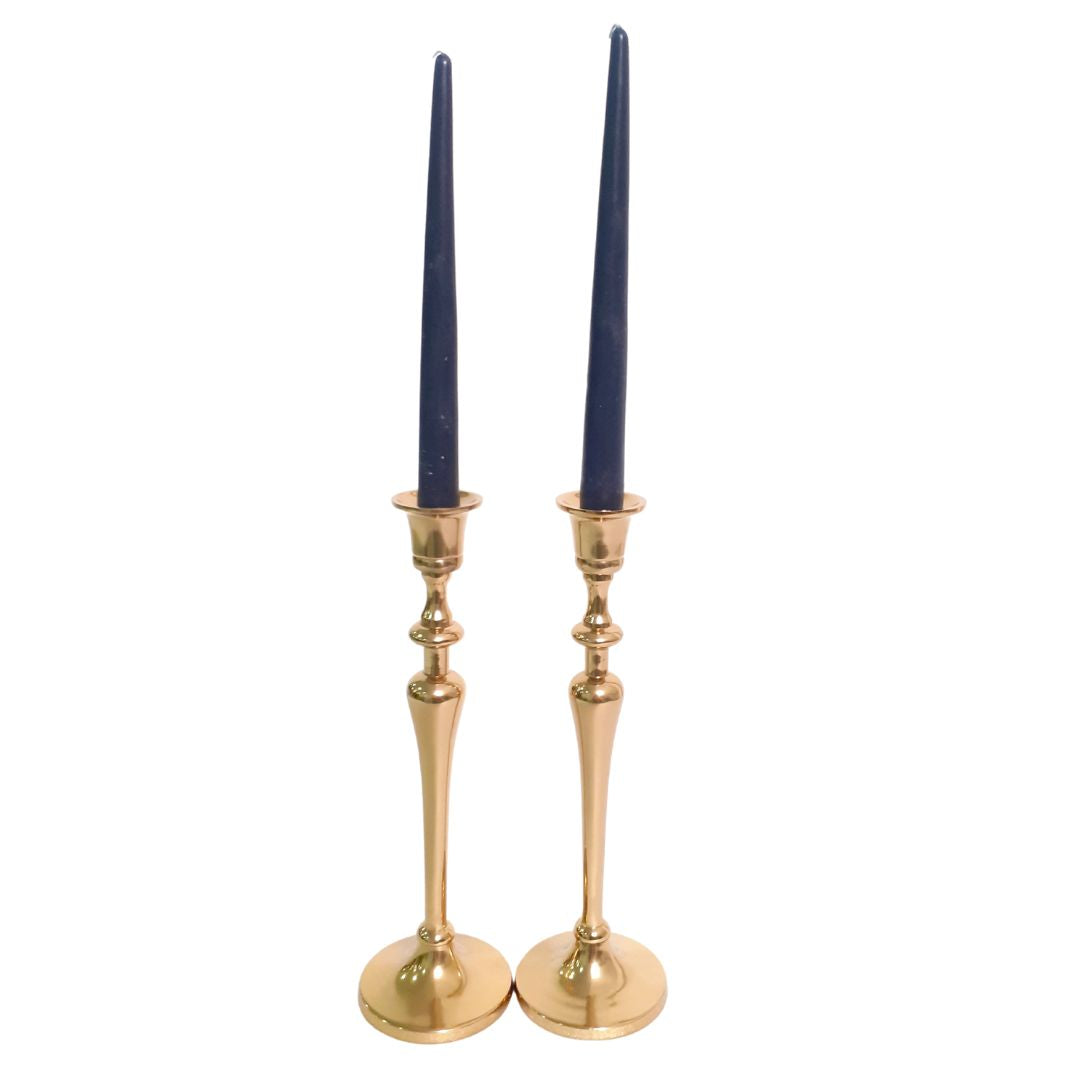 Vintage gold brass holder on a wooden table