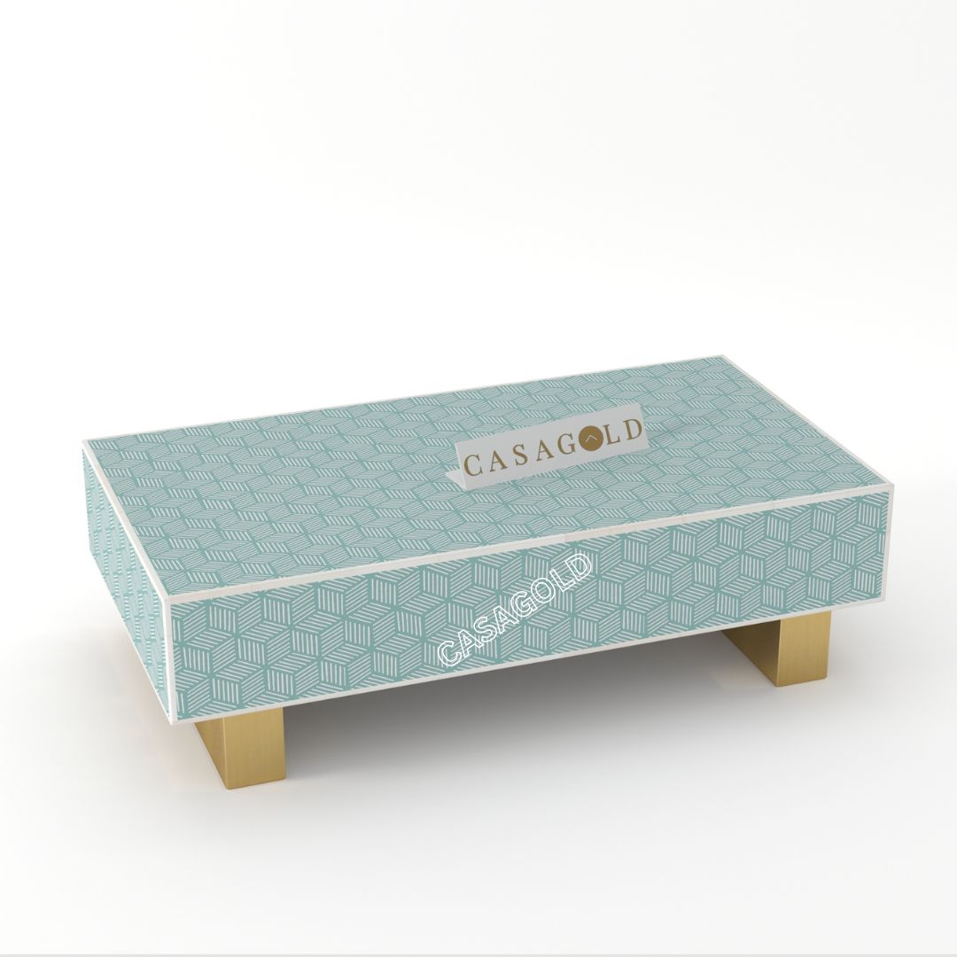 "White and gold rectangular coffee table featuring luxurious bone inlay"