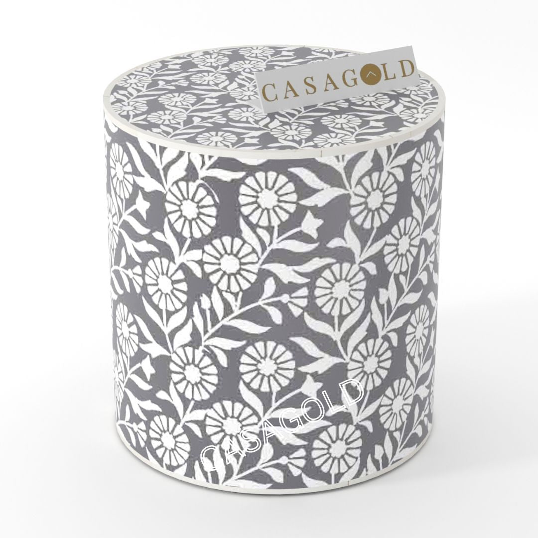 "Bold drum-shaped inlay side table with statement patterns"