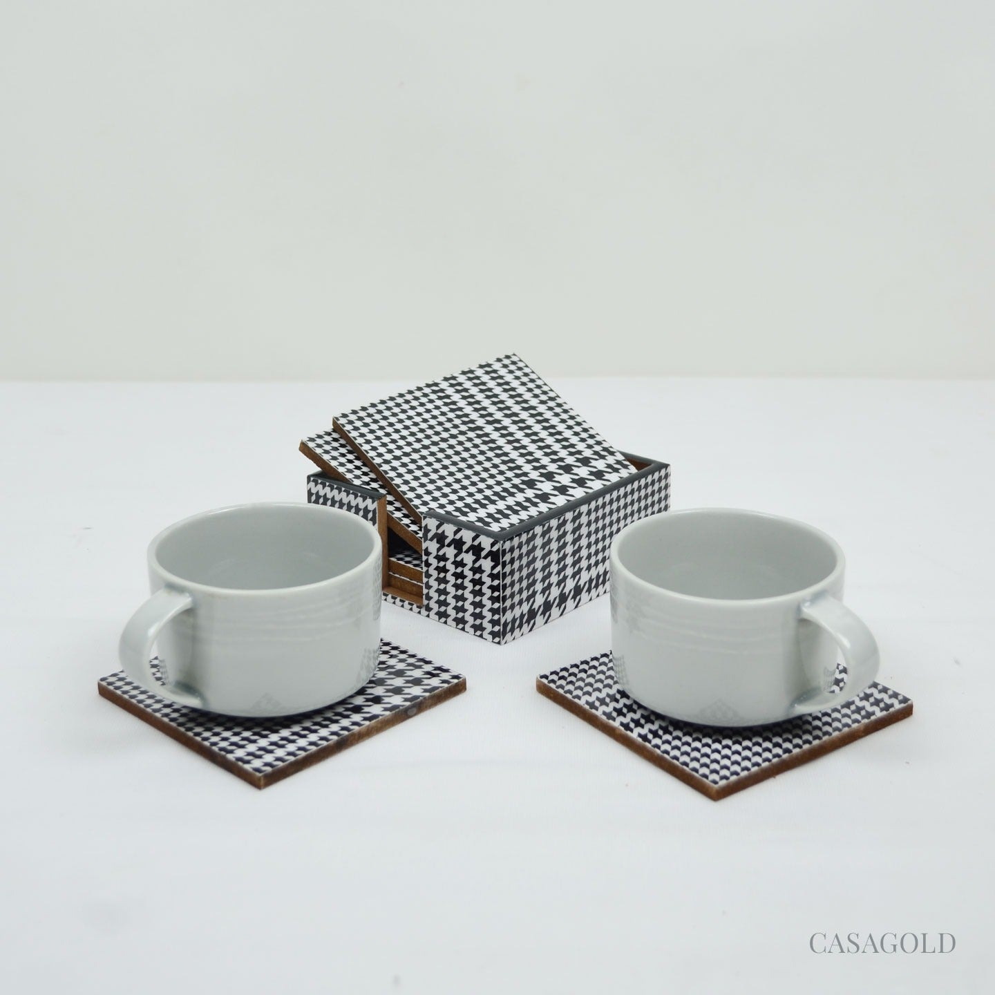 Luxe coaster with an elegant tissue holder design
