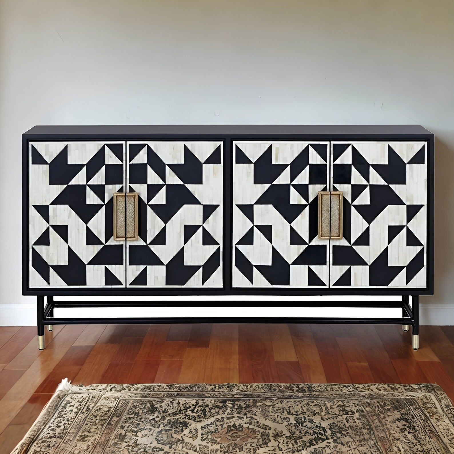 Black and resin inlay sideboard for luxurious interiors.
