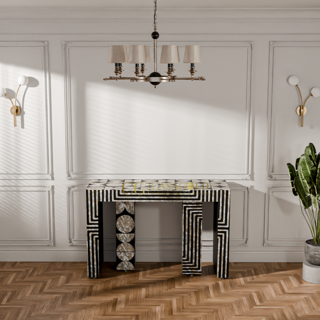 Decorative console table with black and white contrast and circular shell inlay patterns.