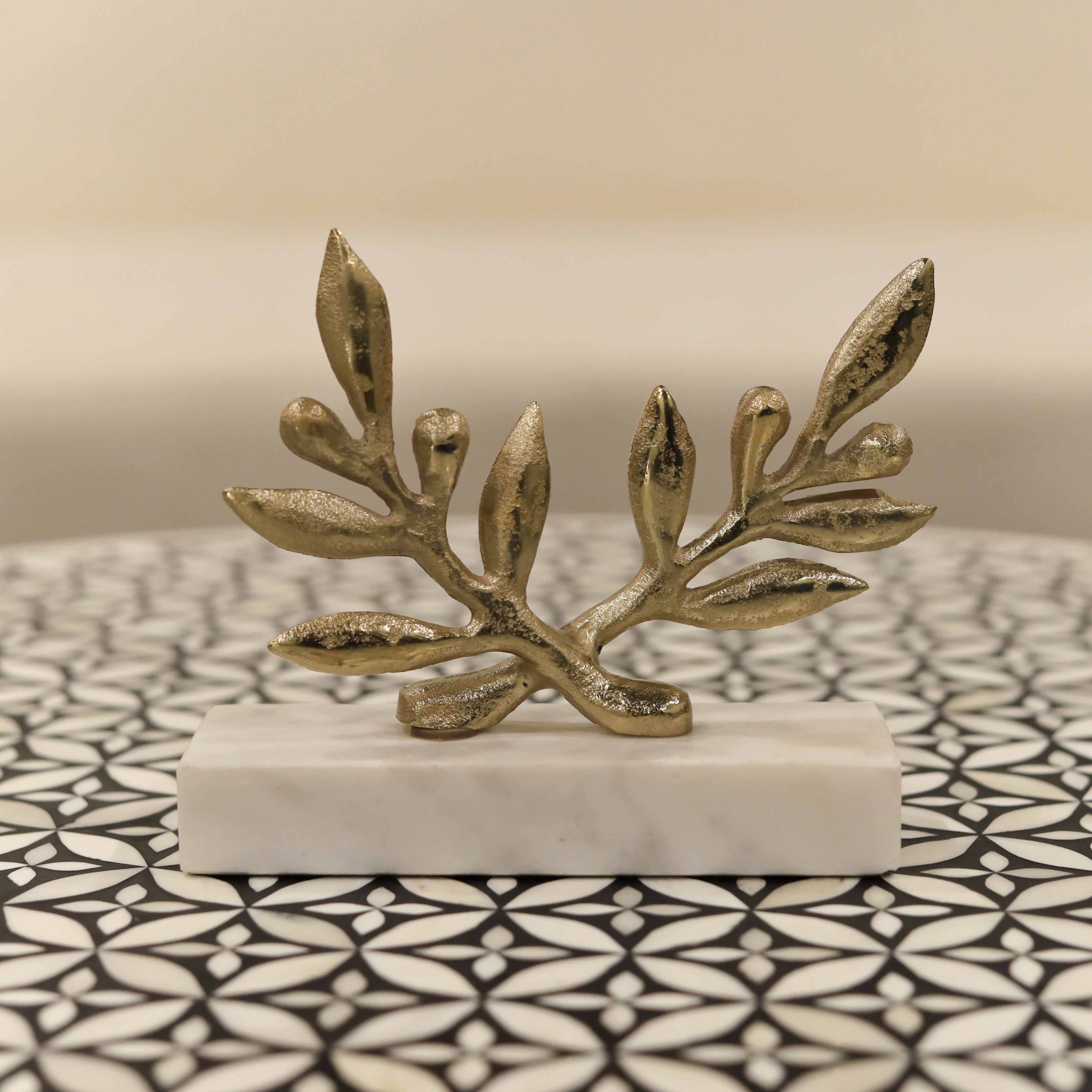 Brass leaf figurine with vintage patina