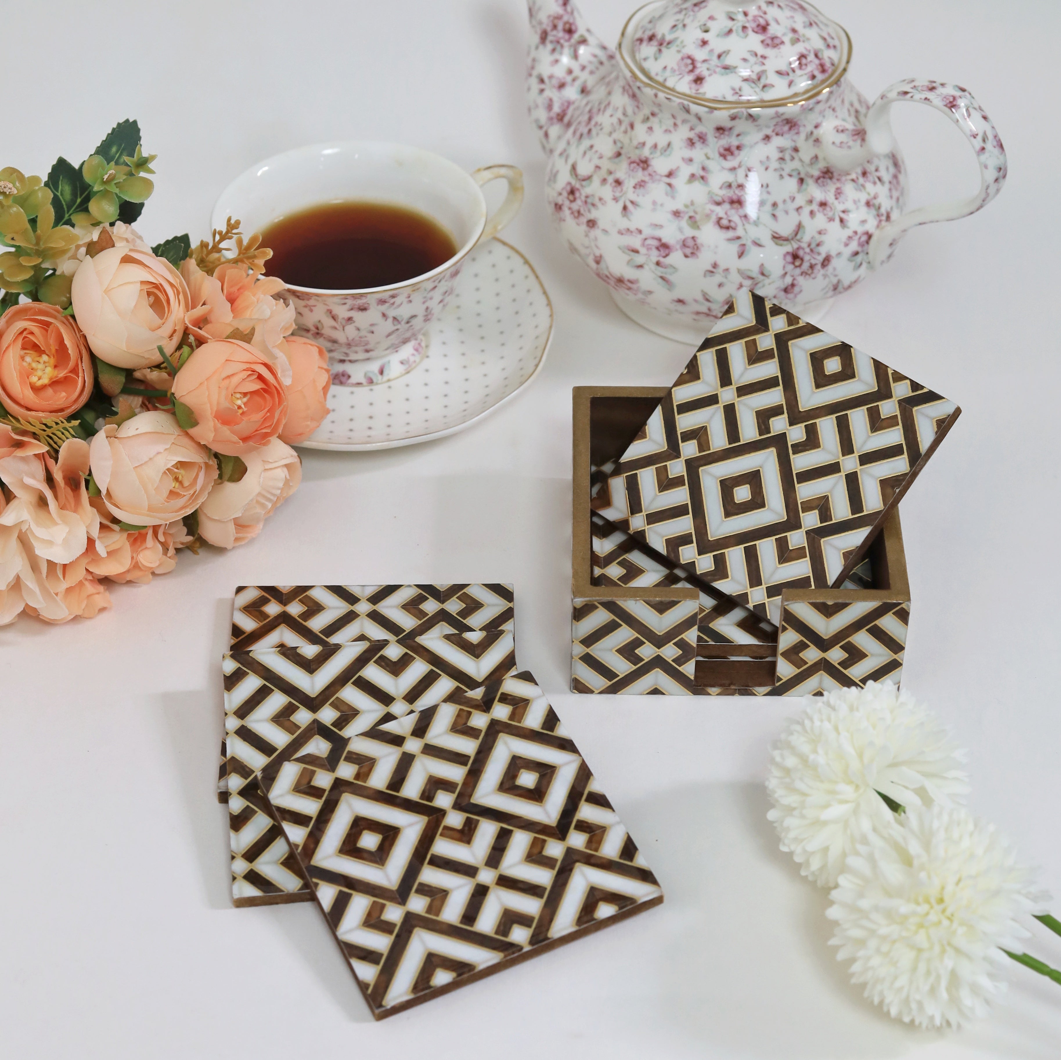 Elegant coaster with matching tissue box for decor
