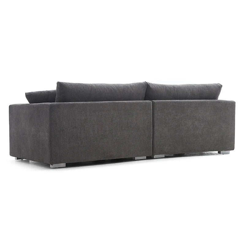 Modern charcoal grey living room sofa with deep cushions, metal legs, and customization options.