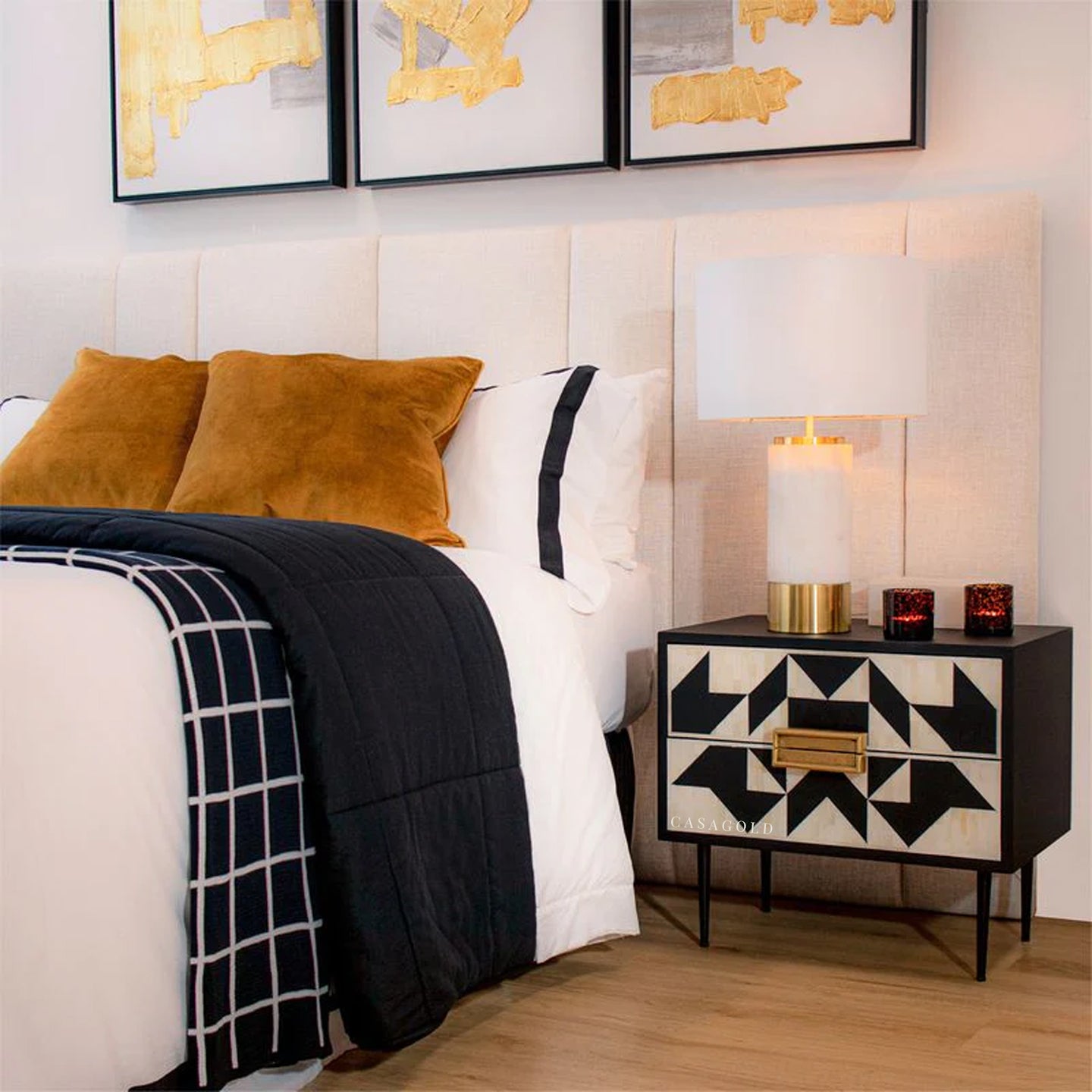 "Compact rectangular bedside table with gold accents and intricate inlay design"

