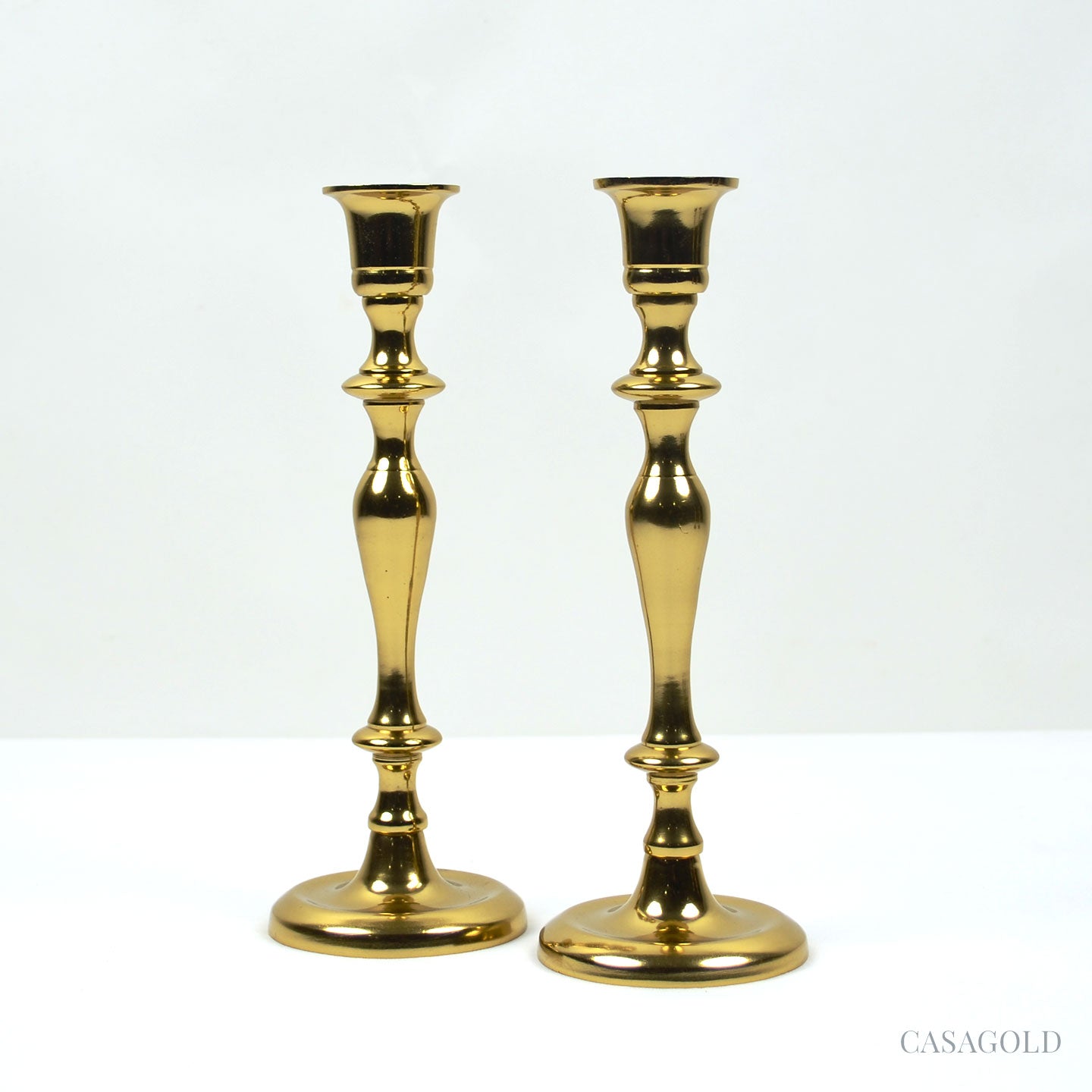 Elegant Brass Candle Holder with Leaf Pattern	