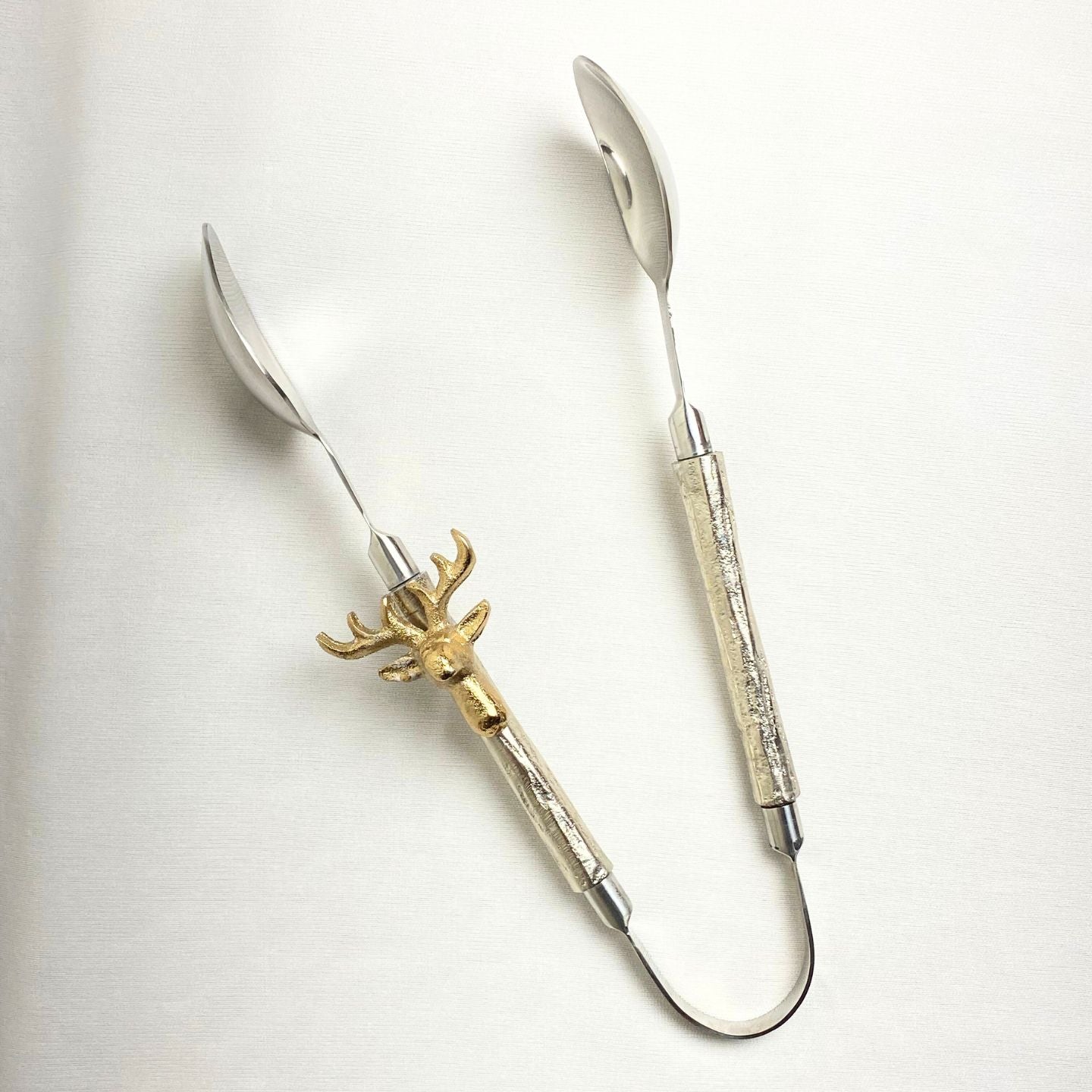 Sophisticated luxury tong with stag design
