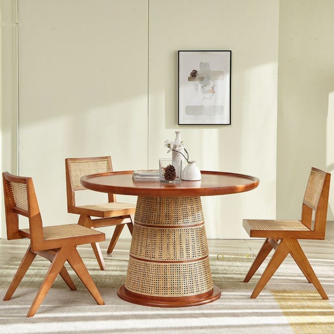 Elegant round dining table with rattan chairs and wooden frame