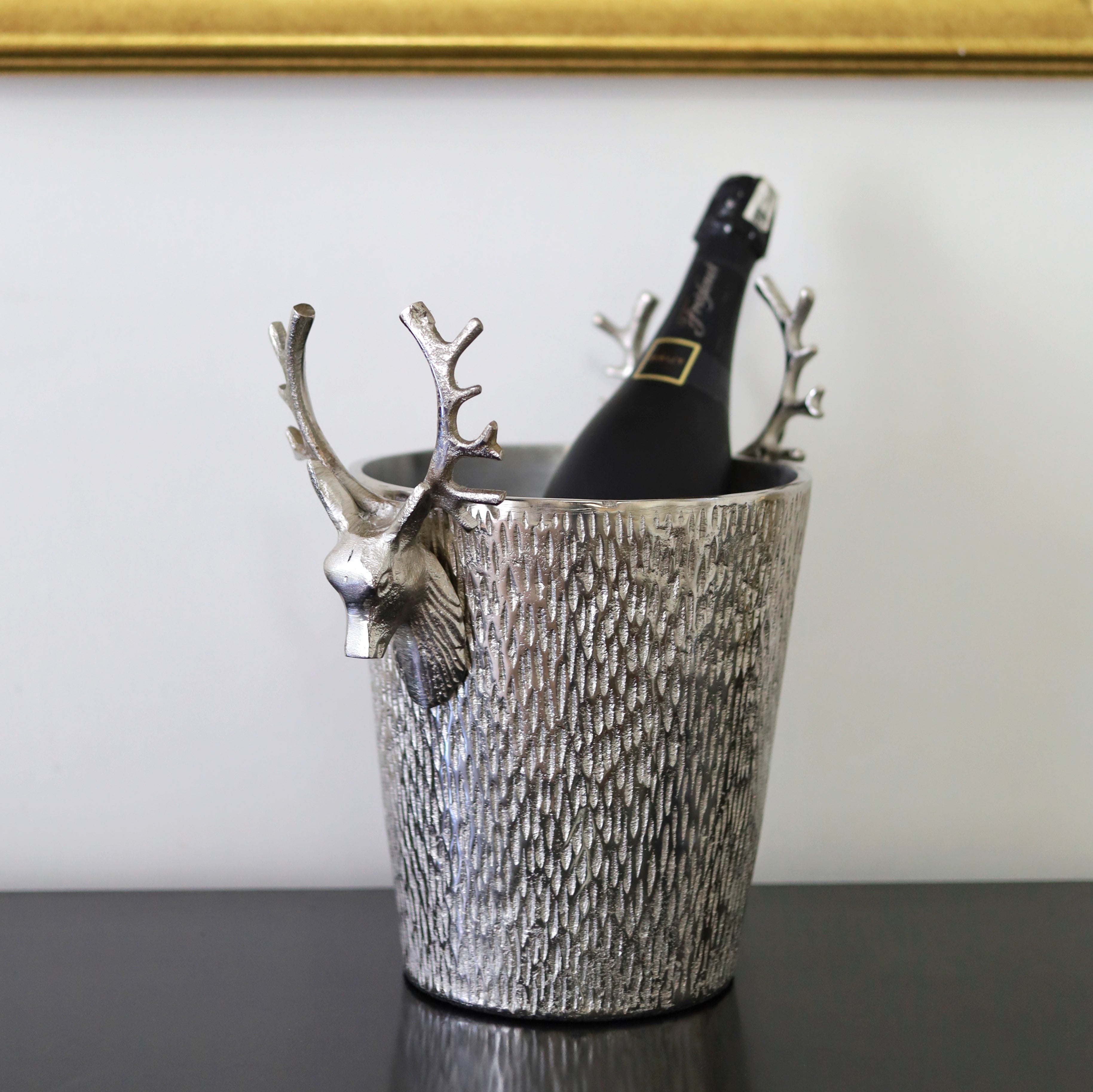 Sophisticated wine cooler with stag design
