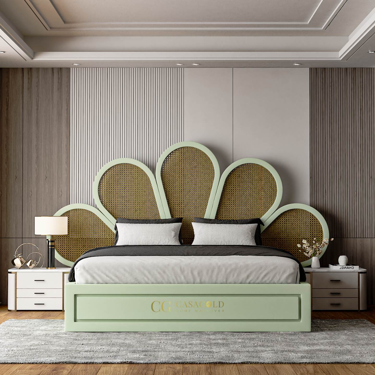 White designer bed with black-accented pillows and floral wall decor.
