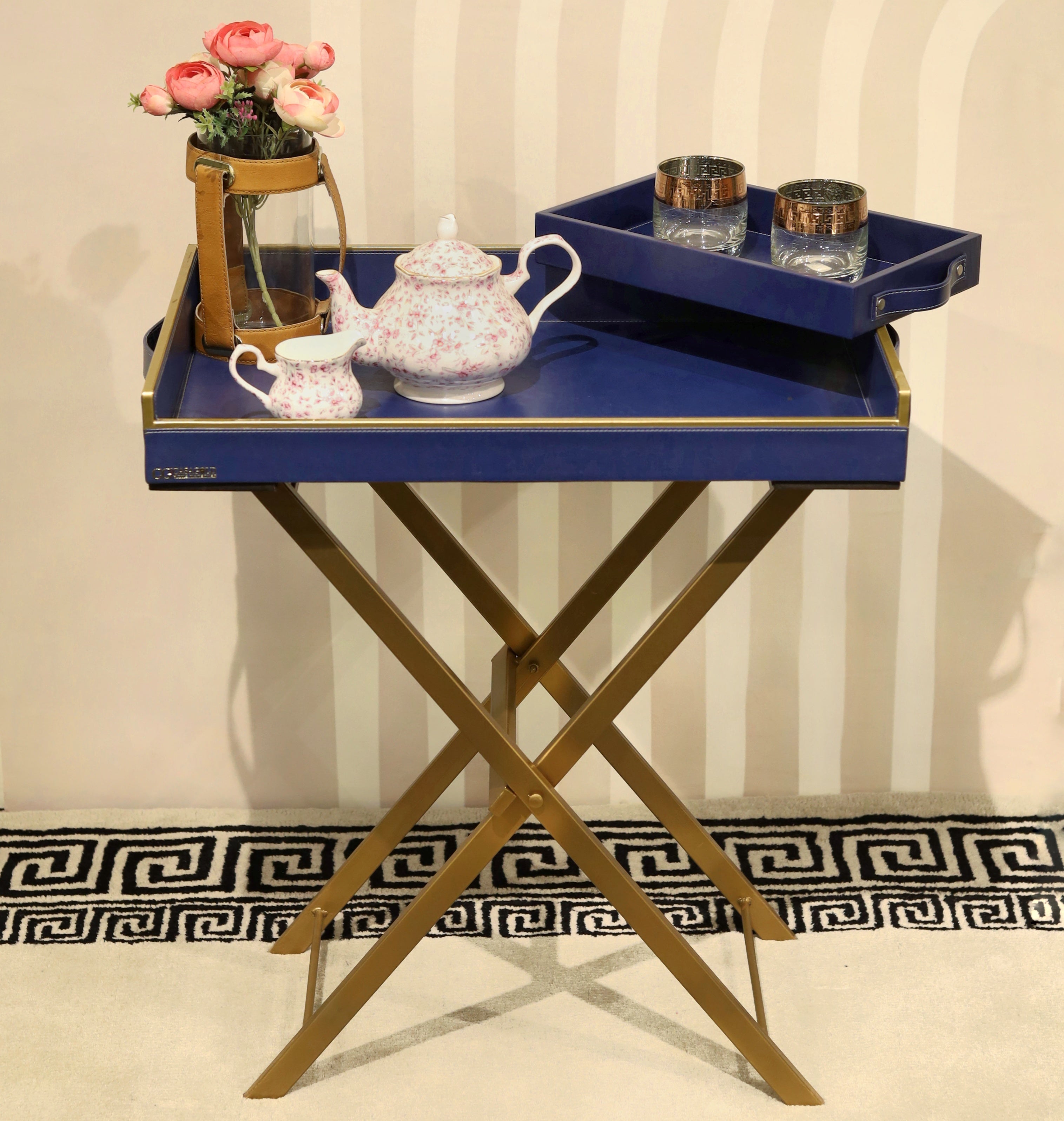 Leather tray with gold trim for opulence

